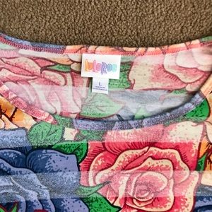 LuLaRoe Tops - LuLaRoe Irma Disney Roses tunic top size large. LuLaRoe Tops - LuLaRoe Irma Disney Roses tunic top size large.